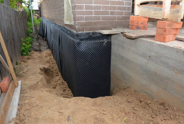 Happy homeowners after waterproofing job in Jacksboro